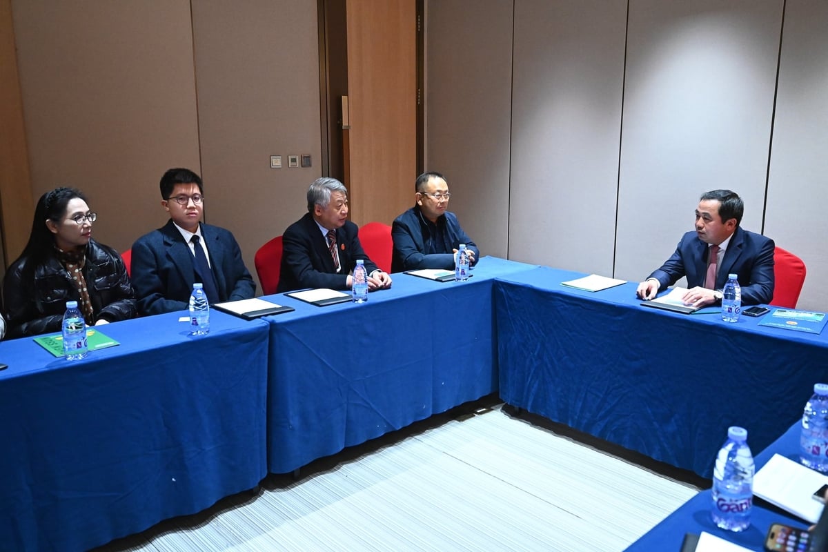 Bộ trưởng Trần Đức Thắng làm việc với Công ty Quân Tín. Ảnh: Tùng Đinh.