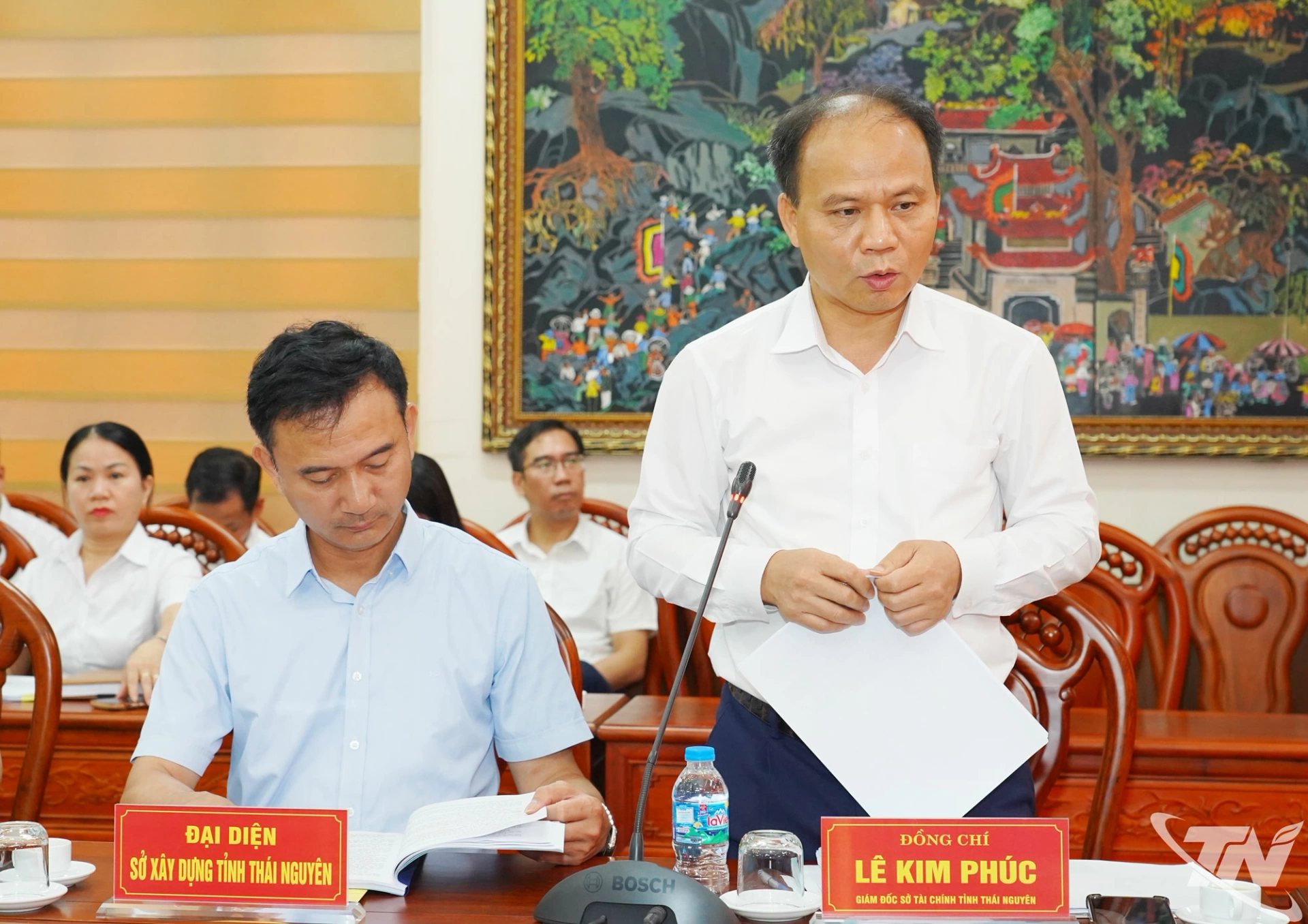 Lãnh đạo Sở Tài chính báo cáo tại Hội nghị.
