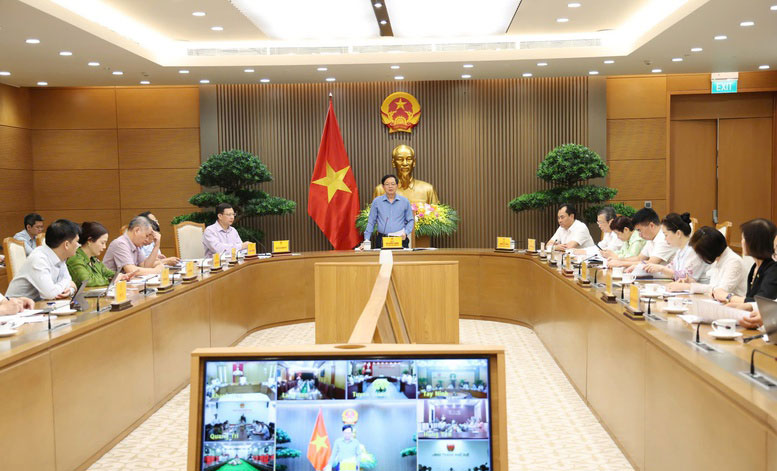 Phó Thủ tướng Hồ Quốc Dũng chủ trì cuộc họp về tình hình quản lý vùng trồng, cơ sở đóng gói và công tác kiểm nghiệm nông sản xuất khẩu - Ảnh: VGP/Gia Huy