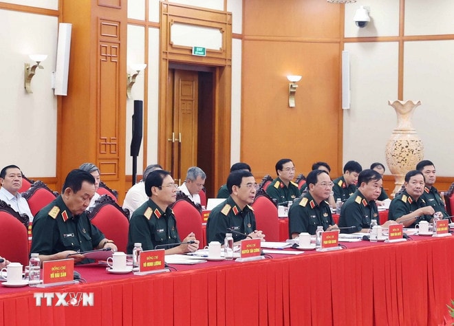 Các đồng chí Ban Thường vụ Quân ủy Trung ương tại buổi làm việc. (Ảnh: Thống Nhất/TTXVN) ttxvn-tong-bi-thu-quan-uy-trung-uong-3.jpg