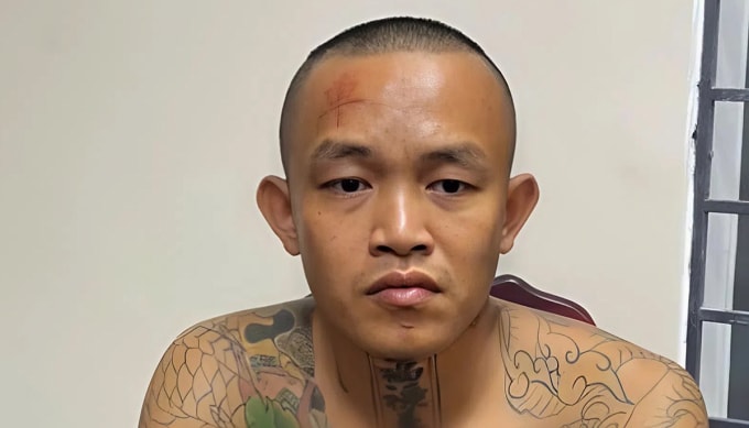 Nghi can Sang tại cơ quan điều tra. Ảnh: Hòa Vang