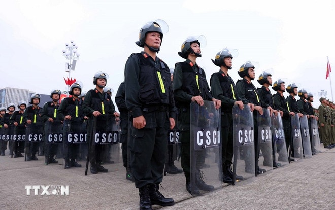 Cán bộ, chiến sỹ Công an nhân dân tham dự buổi Lễ xuất quân. (Ảnh: Phạm Kiên/TTXVN) ttxvn-bo-cong-an-xuat-quan-dam-bao-antt-cho-su-kien-a80-11.jpg