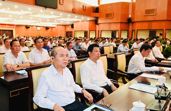 L&atilde;nh đạo TPHCM c&ugrave;ng c&aacute;c đại biểu dự hội nghị. (Ảnh: SGGP)