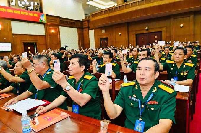 Các đại biểu biểu quyết tại Đại hội. (Ảnh: SGGP)