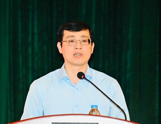 ĐBQH hoạt động chuyên trách tại Ủy ban Pháp luật và Tư pháp của Quốc hội Đỗ Đức Hiển trình bày chương trình hành động tại hội nghị. (Ảnh: SGGP)