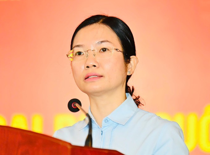 Chủ tịch UBND phường Bình Tiên Vương Thanh Liễu trình bày chương trình hành động. (Ảnh: SGGP)