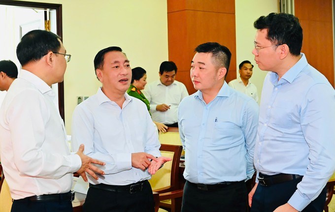 C&aacute;c đại biểu trao đổi tại hội nghị. (Ảnh: SGGP)