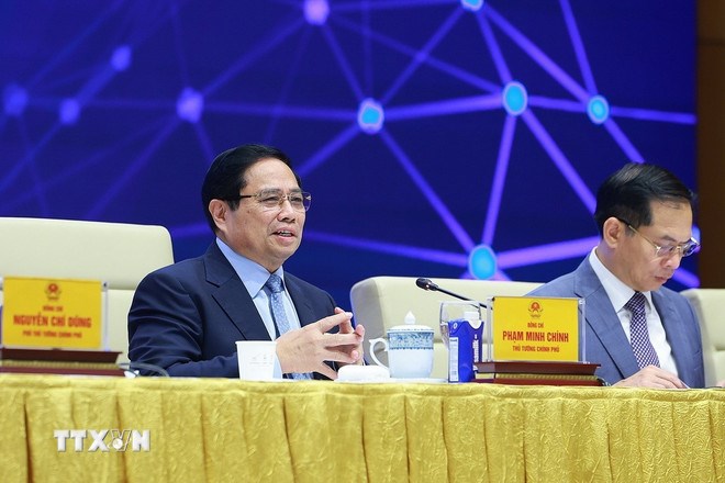 Thủ tướng Phạm Minh Ch&iacute;nh chủ tr&igrave; Diễn đ&agrave;n Quốc gia ph&aacute;t triển kinh tế số v&agrave; x&atilde; hội số lần thứ 3. (Ảnh: TTXVN)