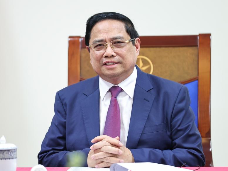 Thủ tướng Phạm Minh Chính điện đàm với Thủ tướng Malaysia- Ảnh 1.